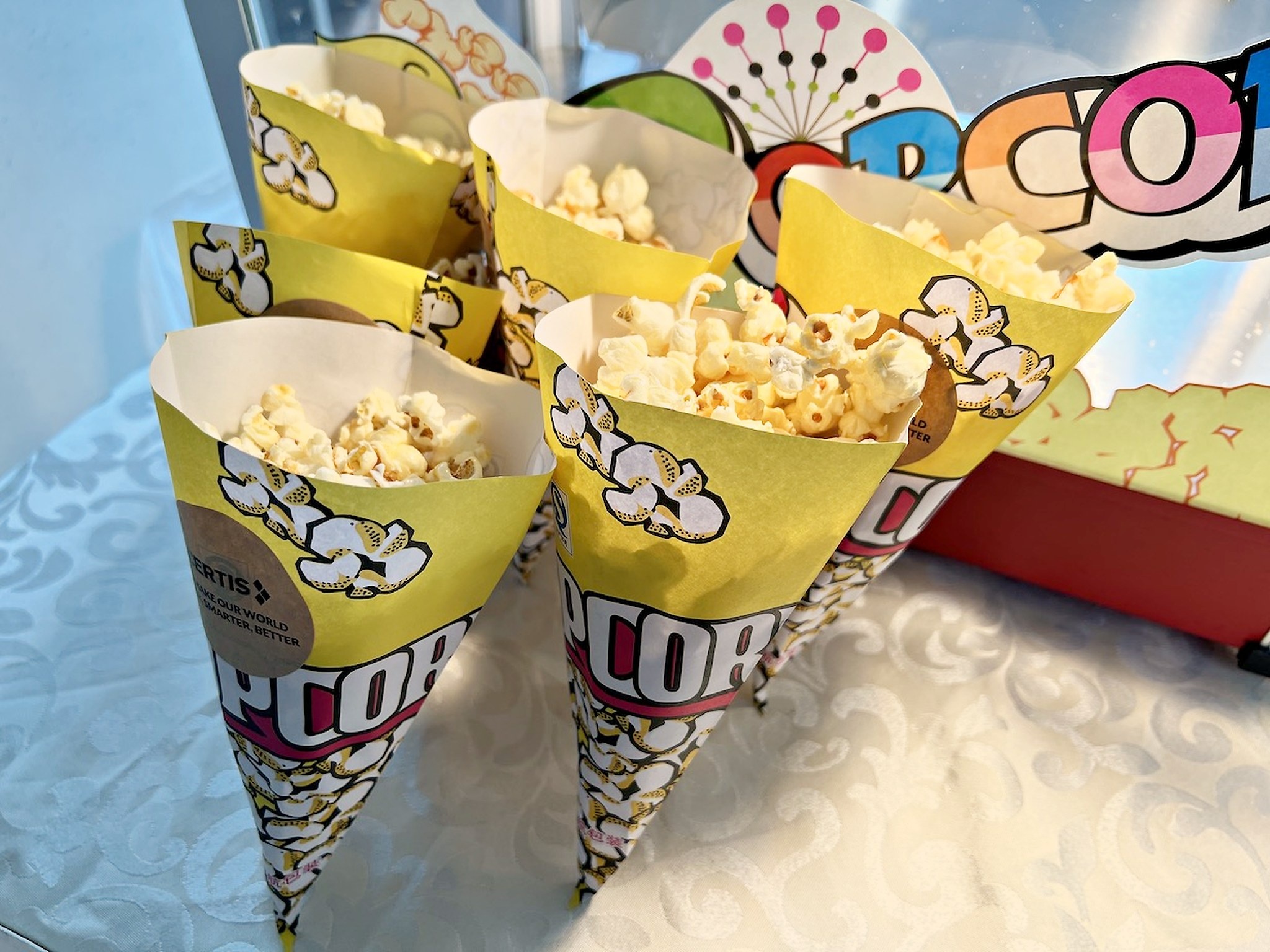 Paper cones filled with popcorn ready for serving