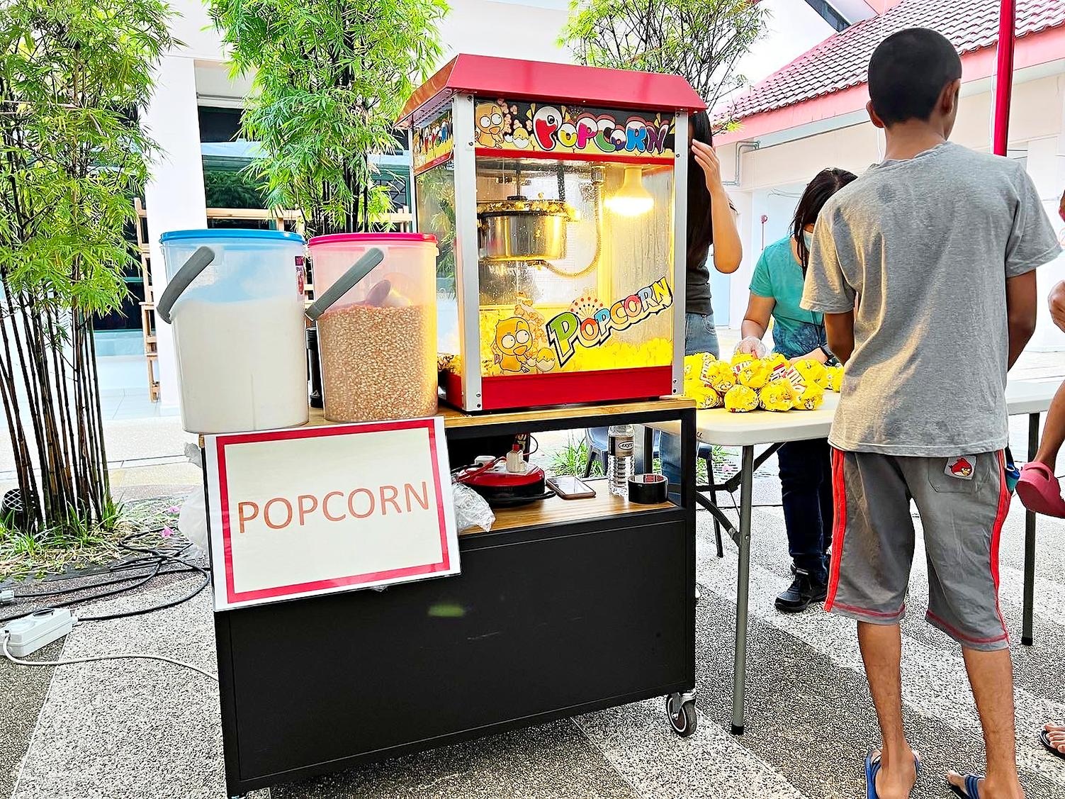 Popcorn station with an outdoor collection counter