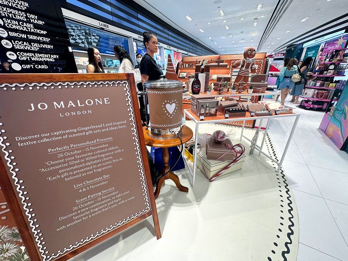 Gingerbread styled hot chocolate counter at a branded event
